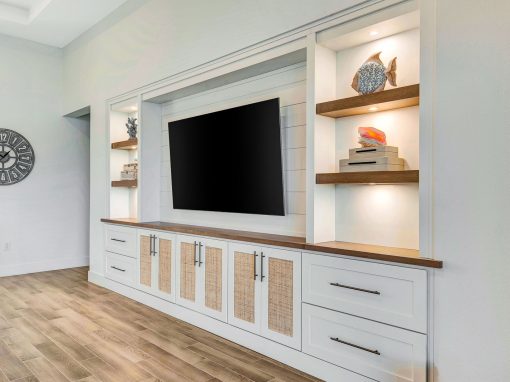 Custom entertainment center built-in Custom entertainment center with substantial built-in cabinetry